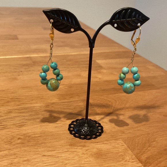 Genuine turquoise bead earrings.  Handmade.  Pierced. L:  2 in. W:  3/4 in. - Picture 2 of 3